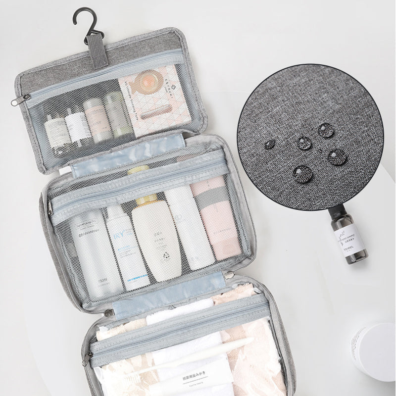 Travelique Organisateur de Voyage pour Cosmétiques | Compact & Résistant à l'eau | Avec 4 Compartiments & Crochet à 360° | Pour Femmes & Hommes