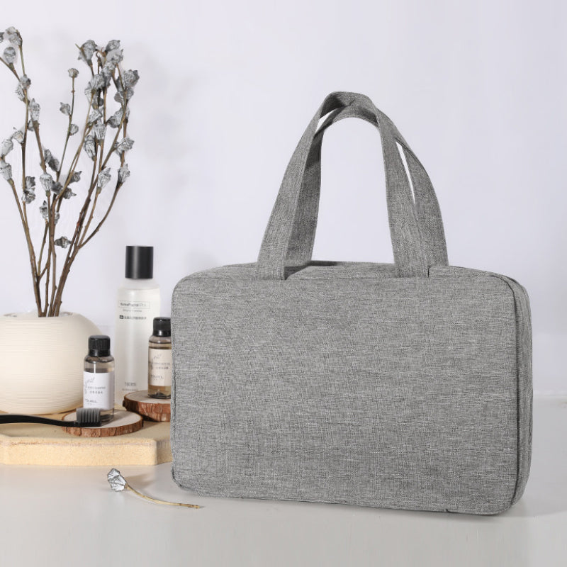 Travelique Organisateur de Voyage pour Cosmétiques | Compact & Résistant à l'eau | Avec 4 Compartiments & Crochet à 360° | Pour Femmes & Hommes