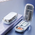 Coupe-pilules portable avec fentes ajustables