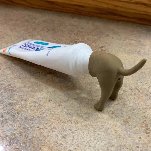 Porte-pâte à dents Chiot qui fait caca