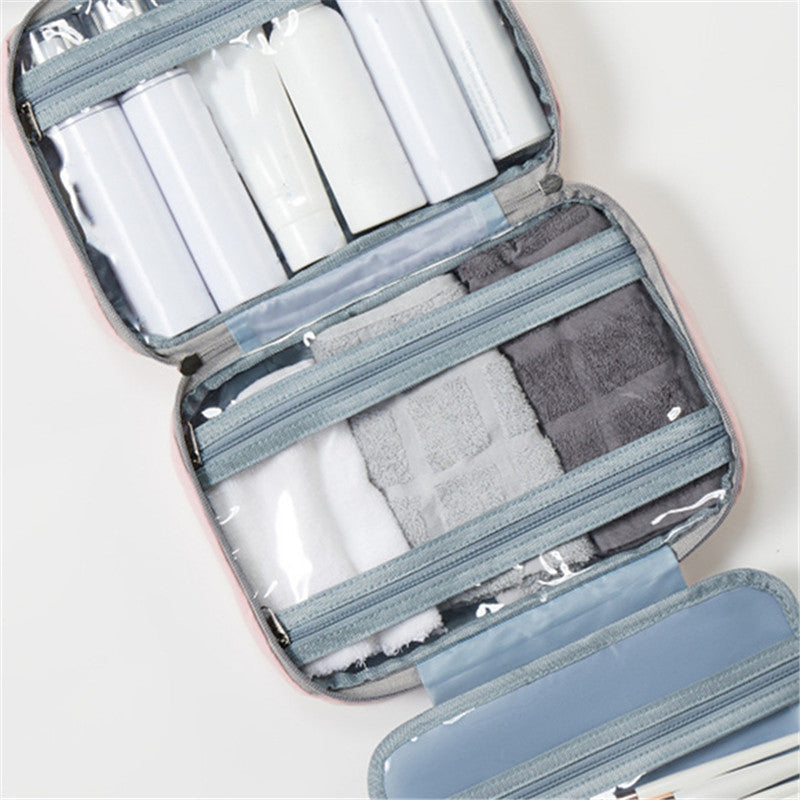 Travelique Organisateur de Voyage pour Cosmétiques | Compact & Résistant à l'eau | Avec 4 Compartiments & Crochet à 360° | Pour Femmes & Hommes