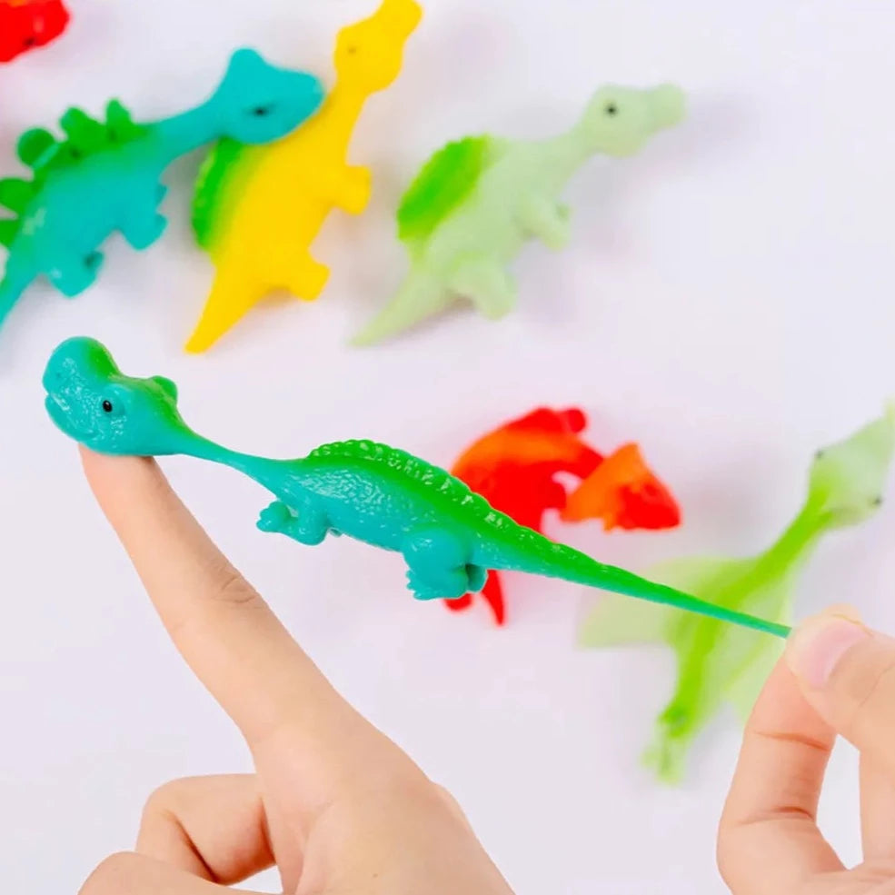 DinoSnap™ — Libérez le Fun Collant des Dinosaures qui Accroche Instantanément Tout le Monde