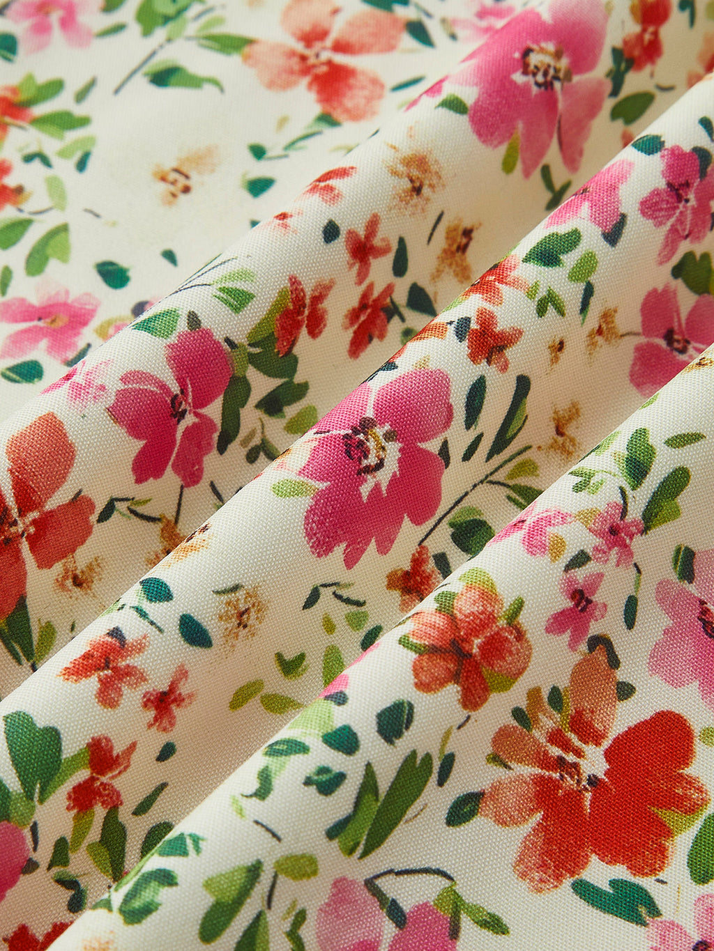 Robe midi à bretelles avec imprimé floral