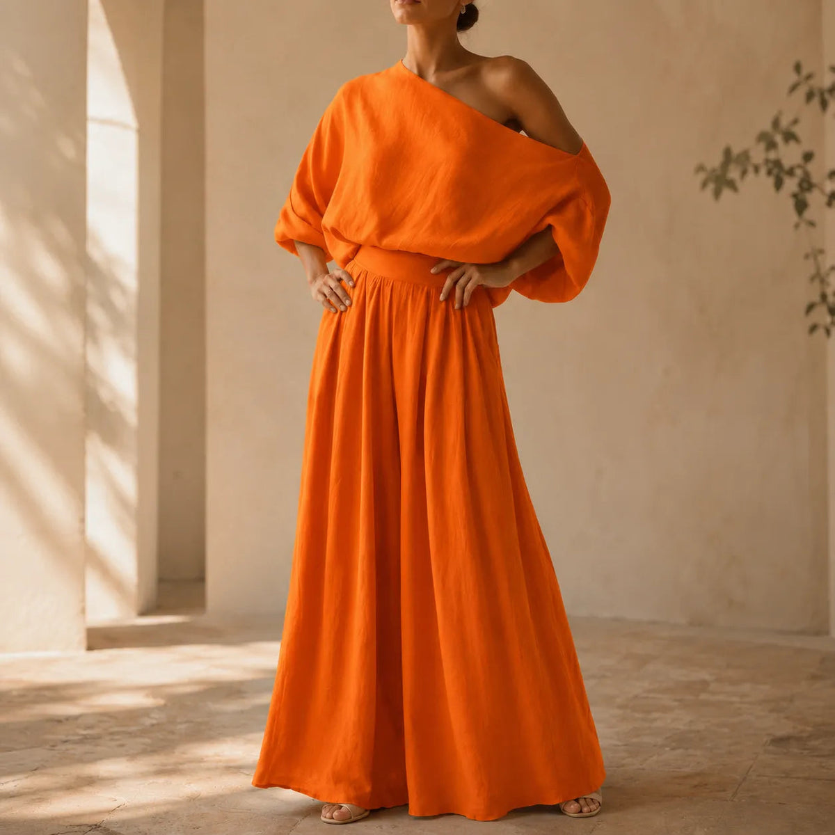 Solendra – Haut coordonné à une épaule et pantalon large fluide
