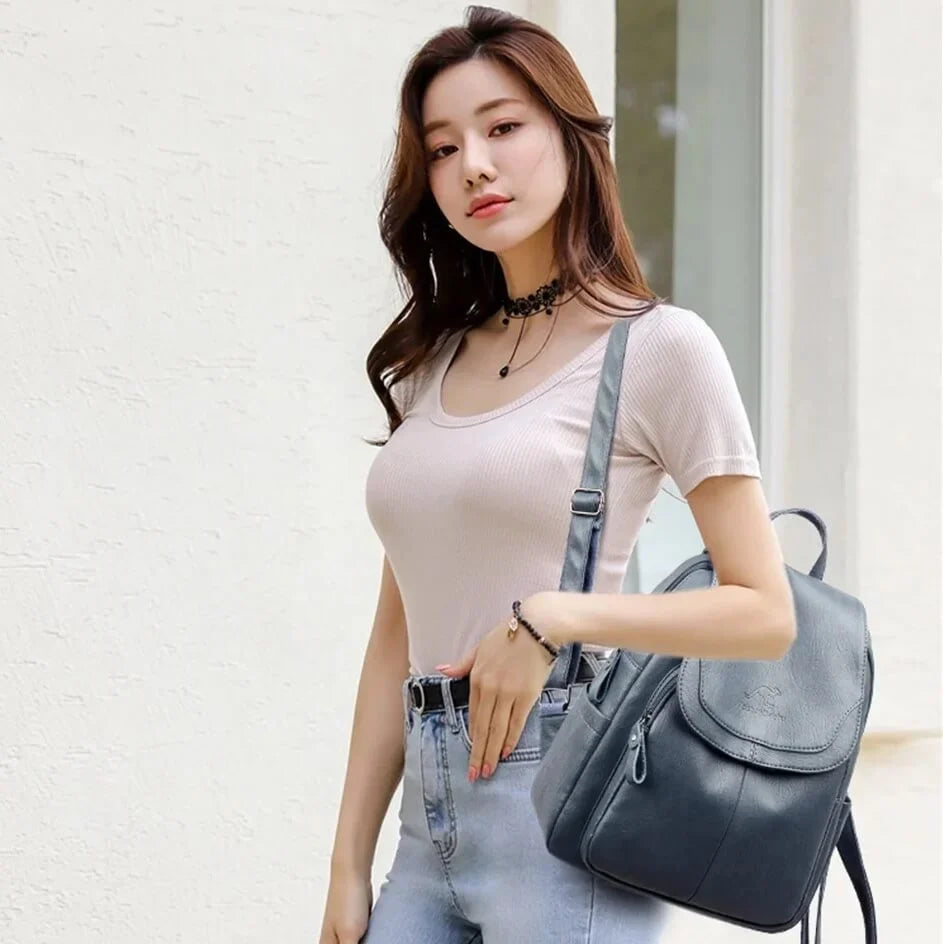 Sac à dos en cuir de vachette avec plusieurs compartiments et fermeture sécurisée