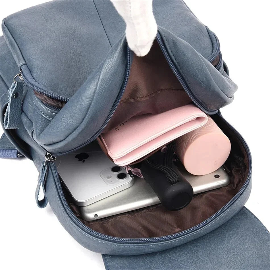 Sac à dos en cuir de vachette avec plusieurs compartiments et fermeture sécurisée