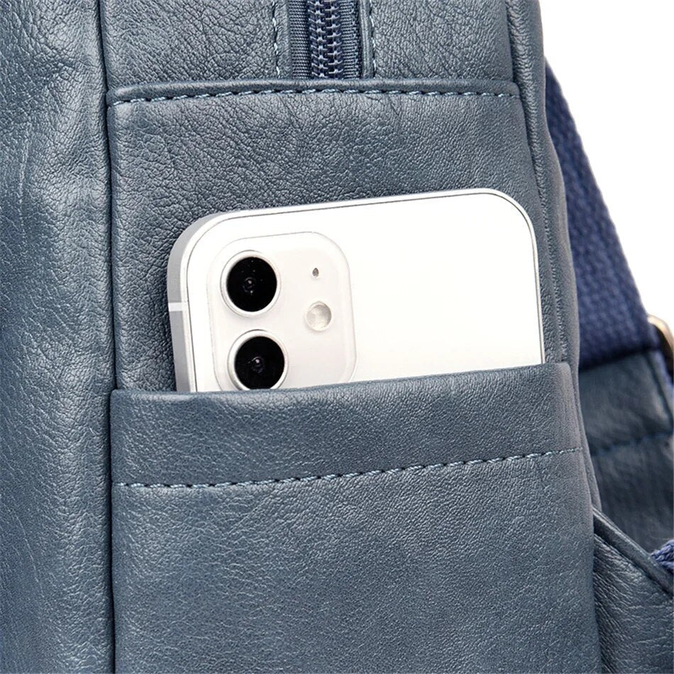 Sac à dos en cuir de vachette avec plusieurs compartiments et fermeture sécurisée