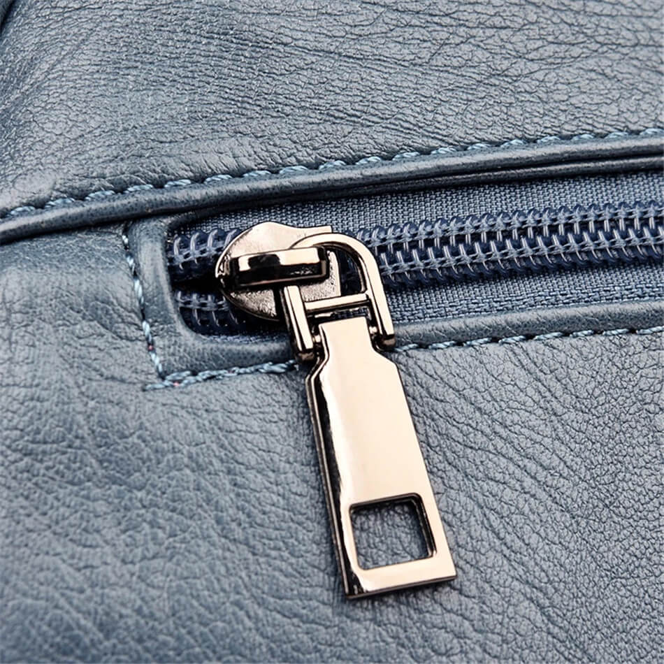 Sac à dos en cuir de vachette avec plusieurs compartiments et fermeture sécurisée