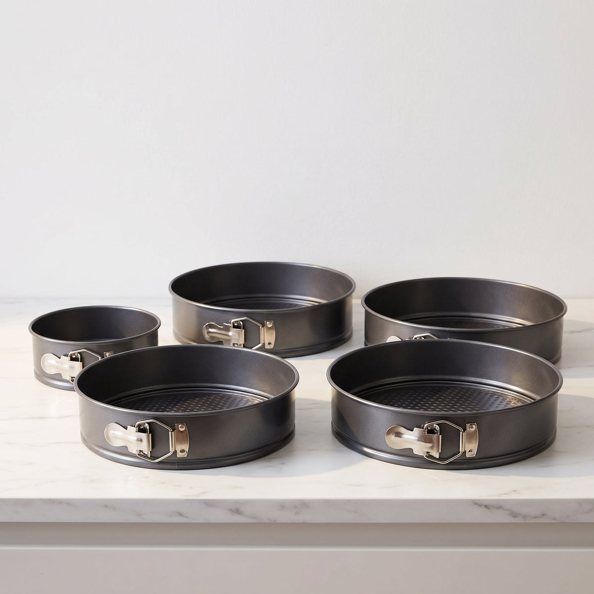 Ensemble de moules à charnière Krumble de 4 – Moules ronds de 12, 18, 24 et 26 cm