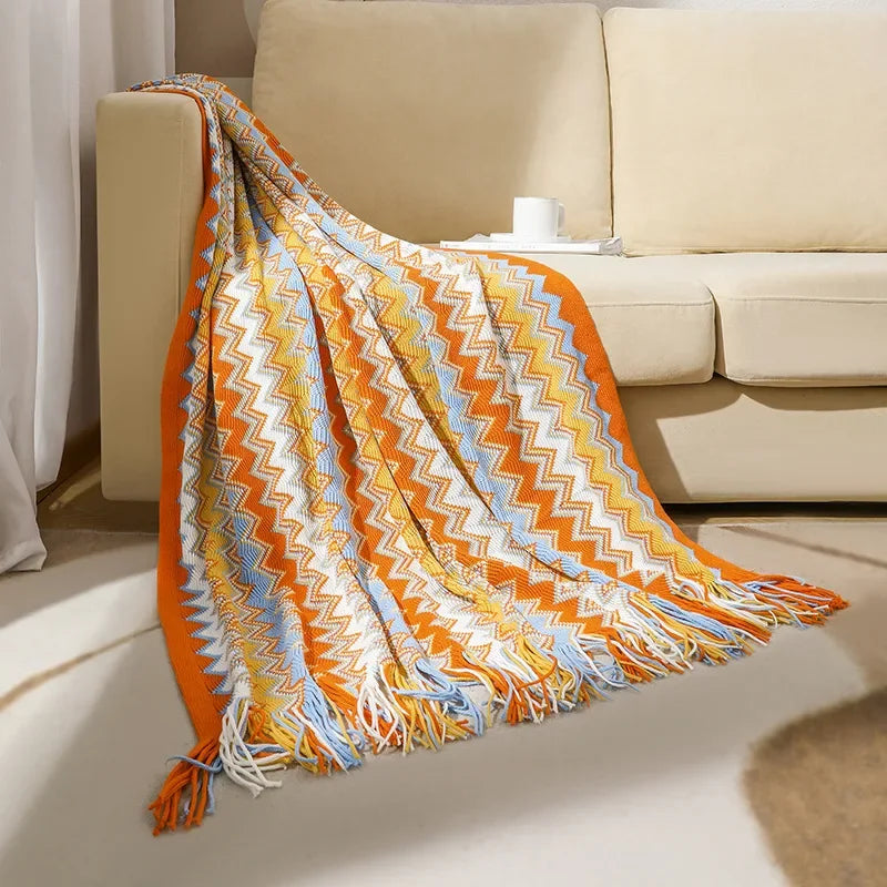 Plaid Boho avec Franges – Douce Couverture avec Motif Géométrique dans des Couleurs Chaudes