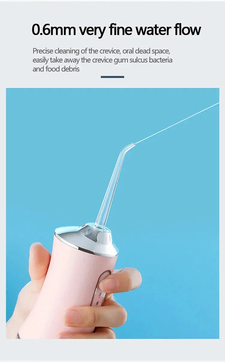 Fil dentaire à eau de voyage avec quatre têtes de nettoyage de remplacement