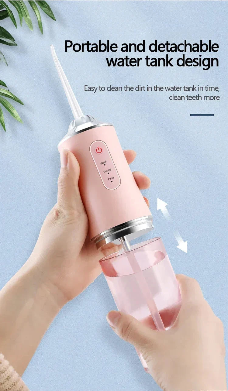 Fil dentaire à eau de voyage avec quatre têtes de nettoyage de remplacement