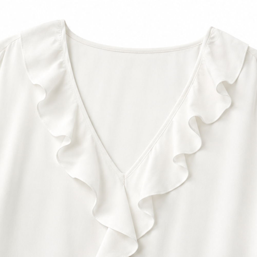 Restedge – La blouse à volants qui effleure, ne colle jamais