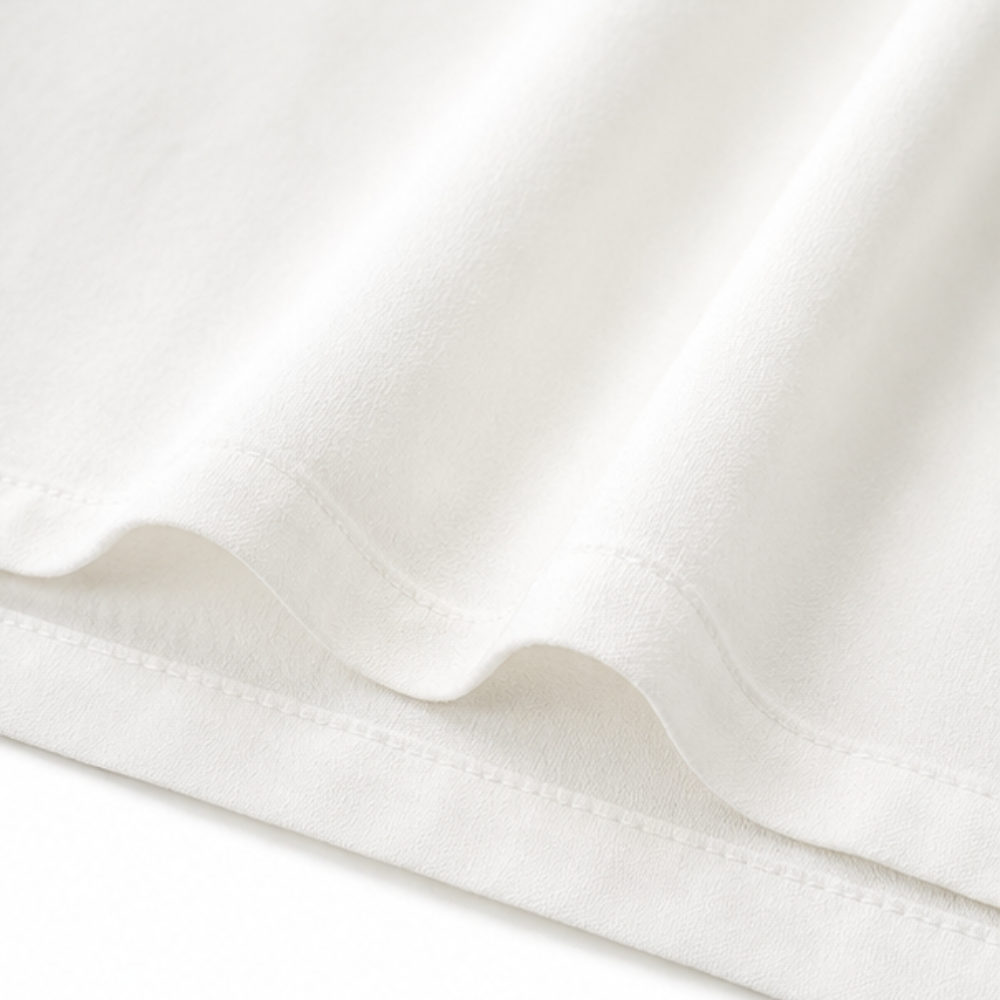 Restedge – La blouse à volants qui effleure, ne colle jamais