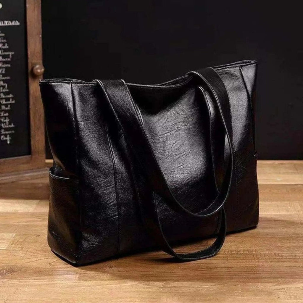 VINTARIS – Sac à bandoulière en cuir élégant avec une touche rétro et une surface lisse