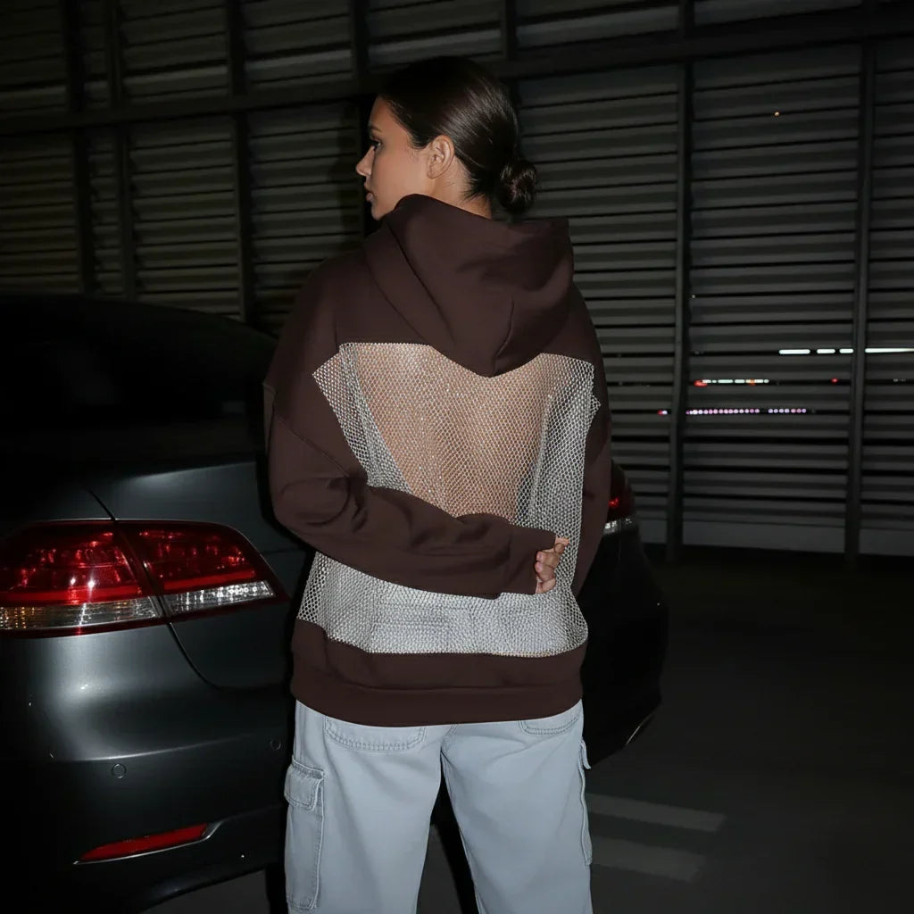 BackStageGlow | Quand les lumières s'allument, ce sweat brille non seulement, mais domine l'espace