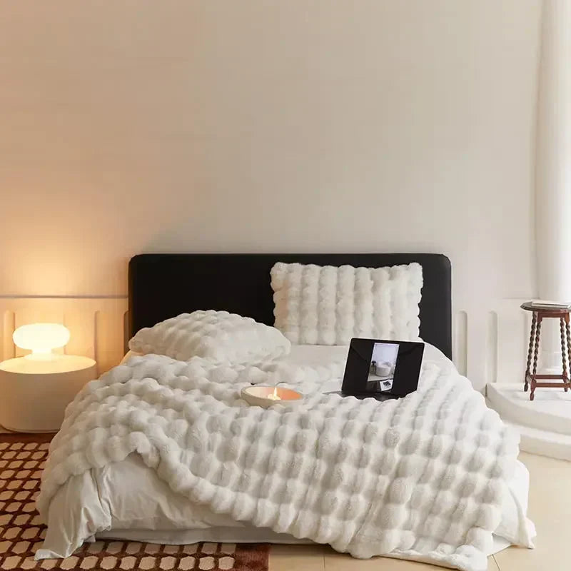 La couverture en peluche dont tout le monde parle ! - Winterzauber WarmWol