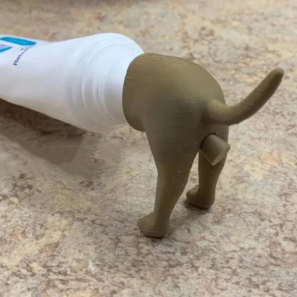 Porte-pâte à dents Chiot qui fait caca