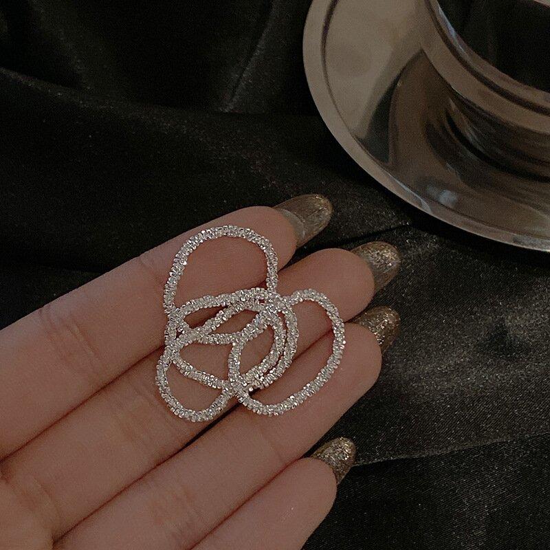 Bague en forme d'étoile argentée