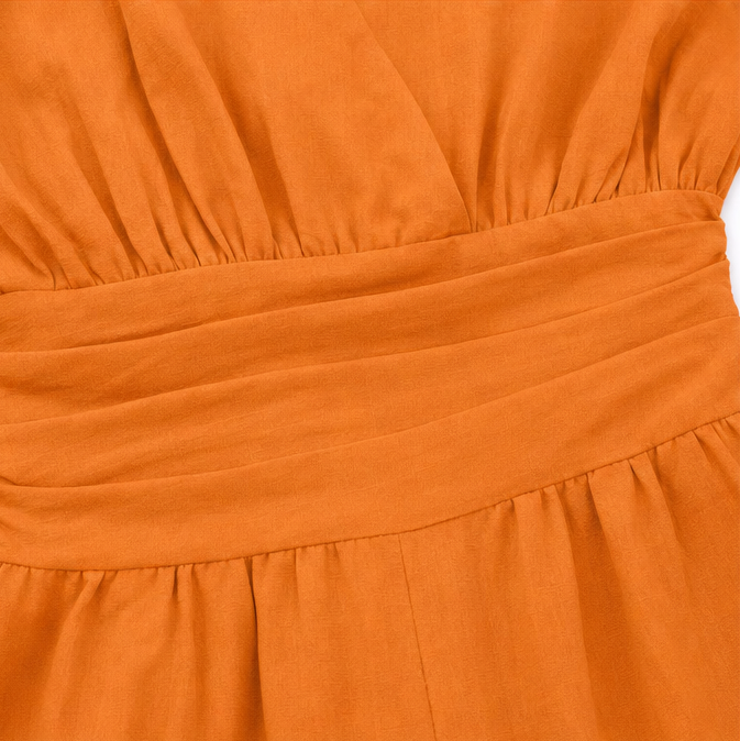 Soléra – Combinaison à jambe large et décolleté en V avec ceinture plissée
