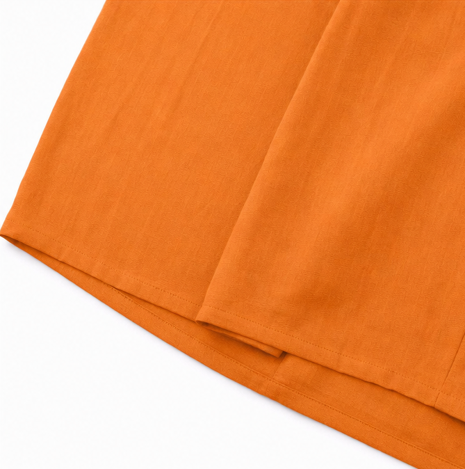 Soléra – Combinaison à jambe large et décolleté en V avec ceinture plissée